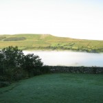 early morning mist over Semer Water, Askrigg Yorkshire Dales clearing